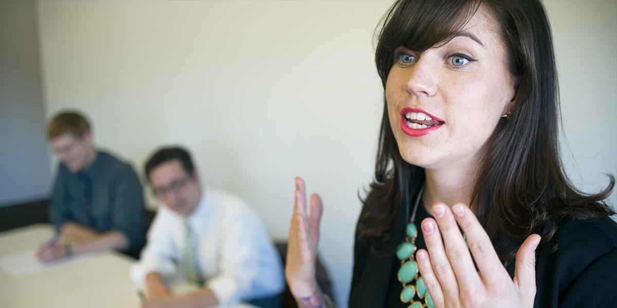 Female debate team member giving a speech